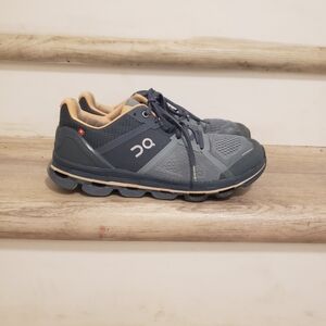 On Running Gray and Tan Sneakers